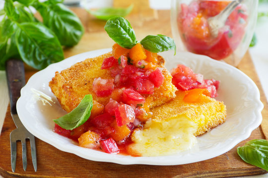 Fried brie with tomato salsa.