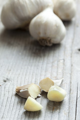 organic garlic on wooden board