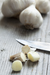 organic garlic on wooden board