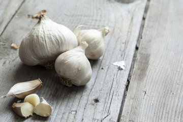 organic garlic on wooden board