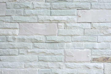Grey granite stone brick on the wall