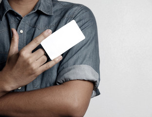 man holding a blank card