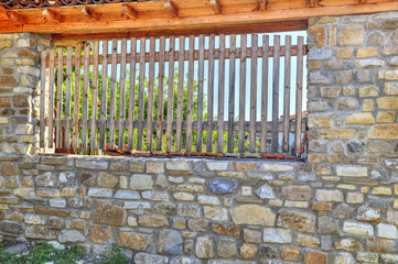 Obraz premium Stylish stone wall with wooden ornaments