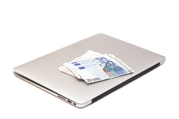 Laptop With  Euro money