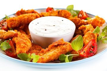 Fried chicken nuggets and vegetables