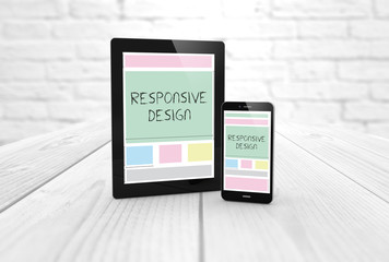 responsive design wireframe on a laptop display and smartphone