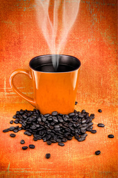 Orange coffee mugs and coffee beans
