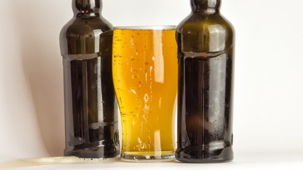 Beer mug along with bottles isolated
