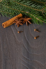 star anise and fir  on background a wooden boards