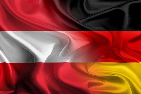 German and Austrian Flags Waving Together