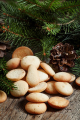 Christmas round gingerbread cookies, cones and spruce branches o