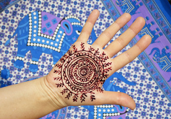 Henna tattoo on the arm