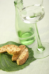 glass of water with italian cantuccini