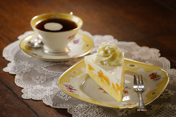 cake with cream and tangerines