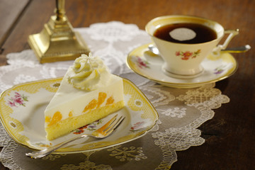 cake with cream and tangerines