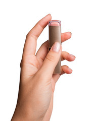 female hand holding lipstick.