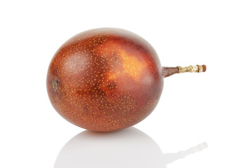 single passion fruit isolated on white