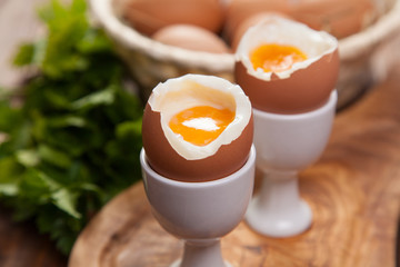Boiled eggs on a wooden background