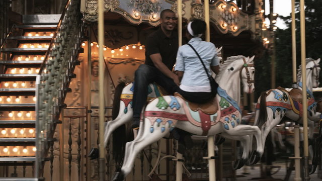 couple on a carousel 