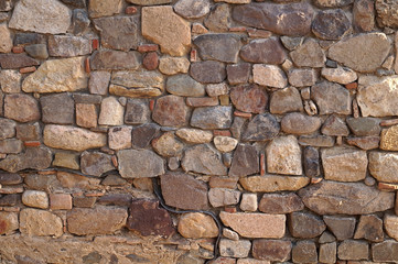 Laying of stones of different colors