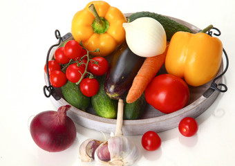 Fresh autumn vegetables on a white background