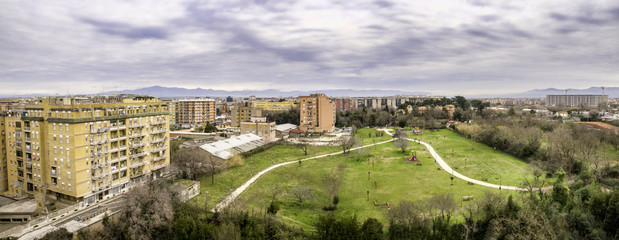Naklejka premium aerial view public park and housing suburb of Rome