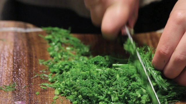 Cutting dill for soup preparation