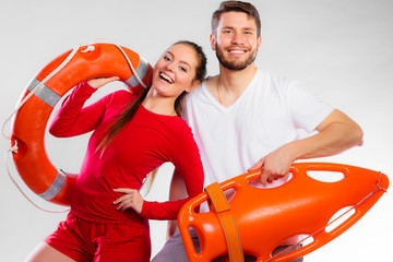 lifeguard couple with rescue equipment