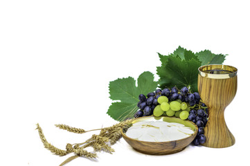 Bread and wine eucharist with grapes and wheat