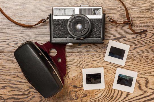 Old film camera and slides