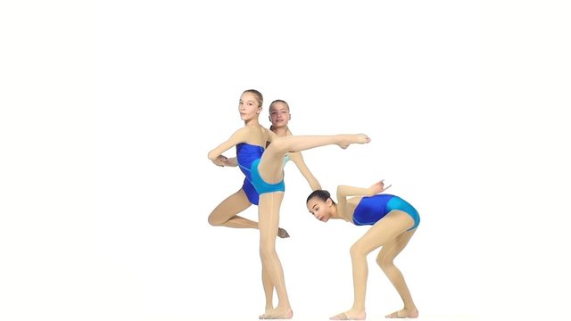 ballet girls posing in blue dress together, slow motion