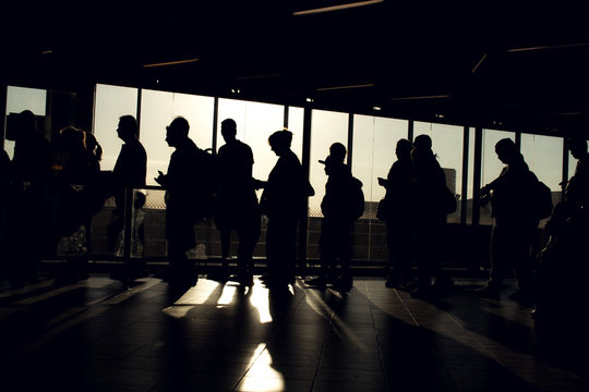 People On Queue With Silhouette