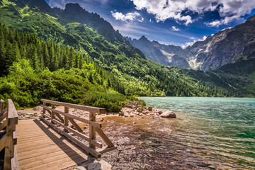 Beautiful lake in the mountains at summer - obrazy, fototapety, plakaty