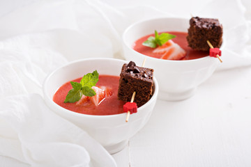 Strawberry dessert with chocolate cake