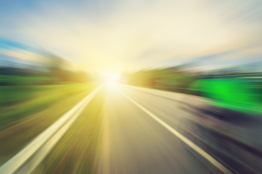 abstract empty asphalt blurry road and sunlight with space