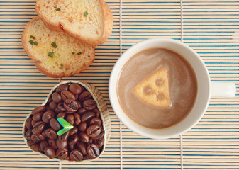 coffee latte in white cup on wooden background, Vintage