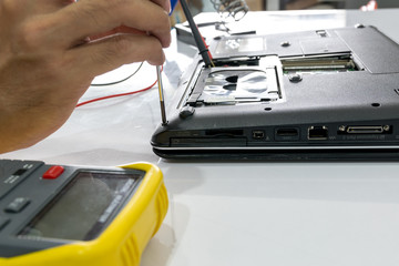 Repairing a notebook.