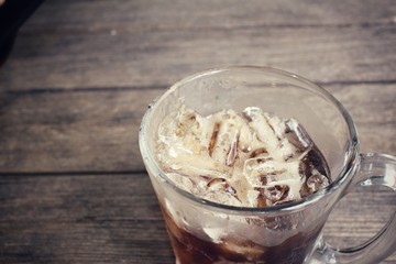 Cola with ice cubes