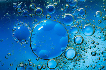 Oil drops on a water surface