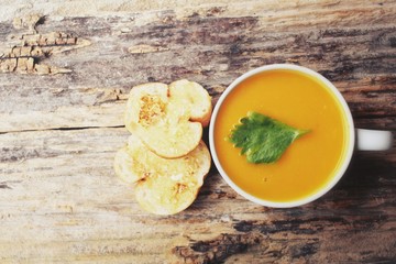 Pumpkin soup with garlic and herb bread