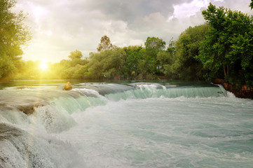 waterfall on the river in the mountains