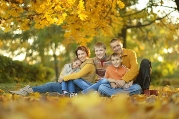 Fototapeta premium Happy family in autumn forest