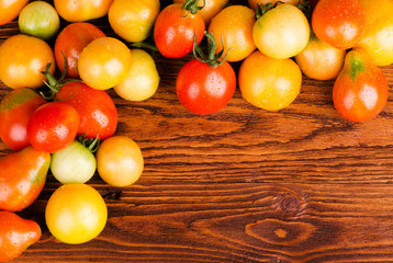 tomatoes, scattered on the wooden surface