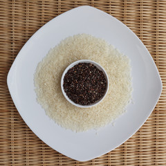 Mixture of dark brown and white rice on two white plates