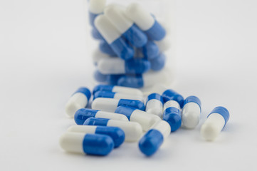 Blue and white capsules