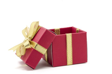 christmas gift box with a gold ribbon bow