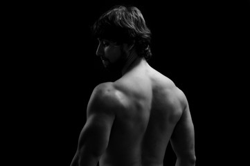 Fototapeta na wymiar studio photography of a man with His back,