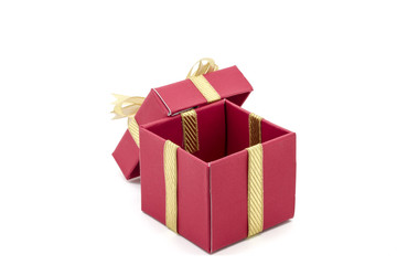 christmas gift box with a gold ribbon bow