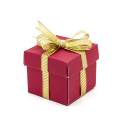 christmas gift box with a gold ribbon bow