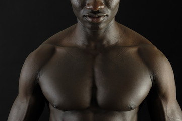 Fototapeta premium A black man with a muscular body